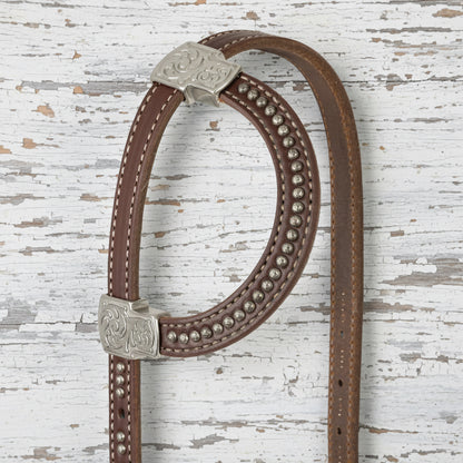 Bride western Weaver Equine Stockman Sliding Ear en cuir Weaver Leather Canyon Rose avec boucle Jeremiah Watt et attaches Blood Knot, zoom sur le passant d'oreille
