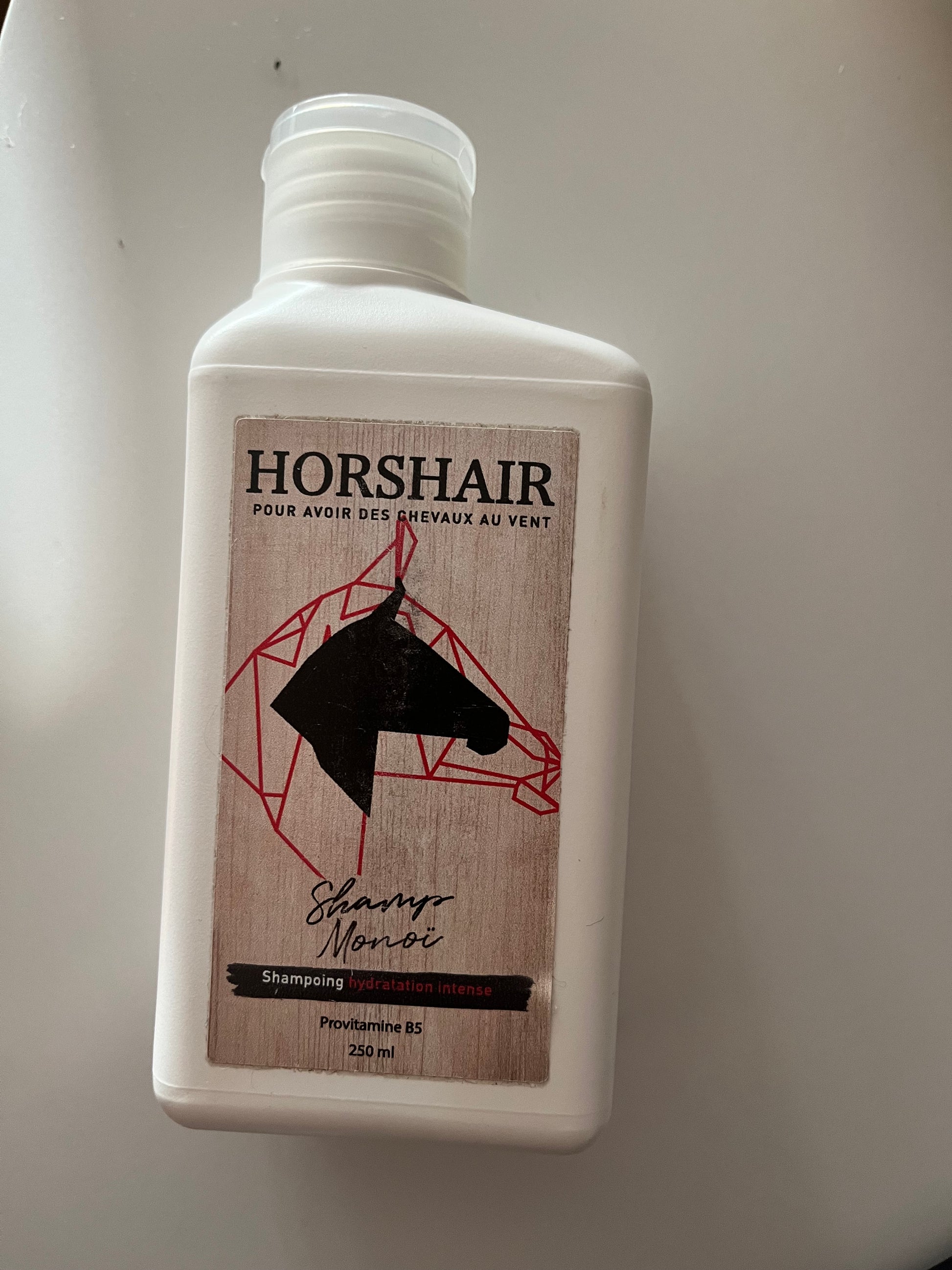 shampoing au mono pour chevaux de la marque Horshair, flacon de 250ml 