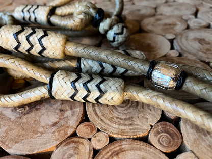 Romals de show en cuir tressé et perles argentées